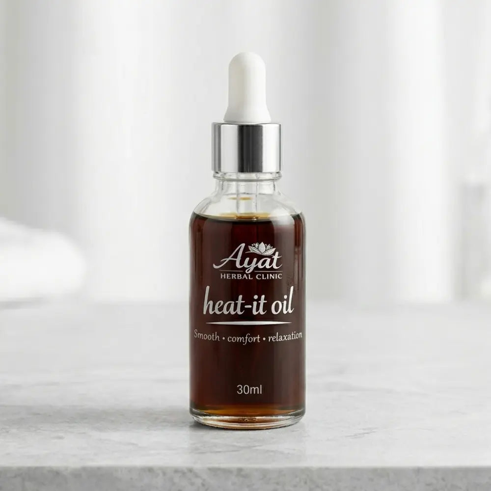 Heat-It Oil by Ayat Herbal Clinic | Comforting Herbal Massage Oil
