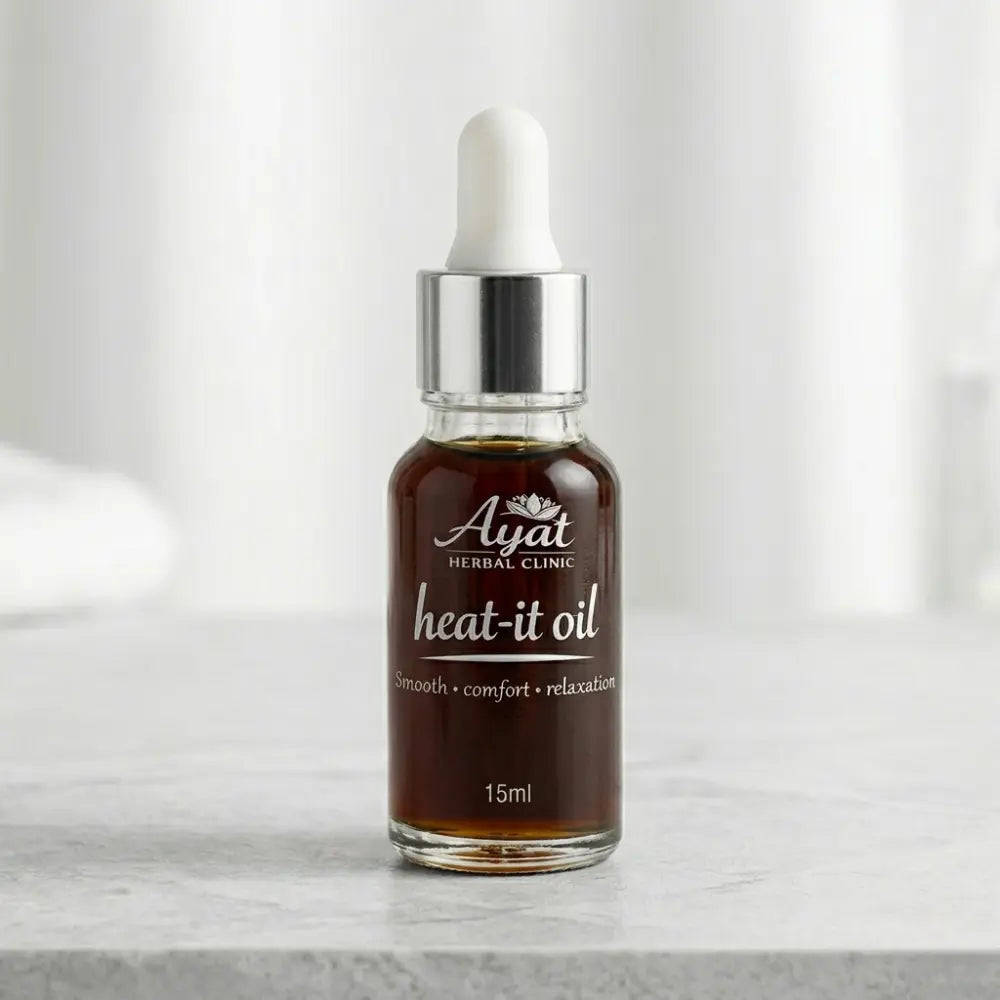 Heat-It Oil by Ayat Herbal Clinic | Comforting Herbal Massage Oil