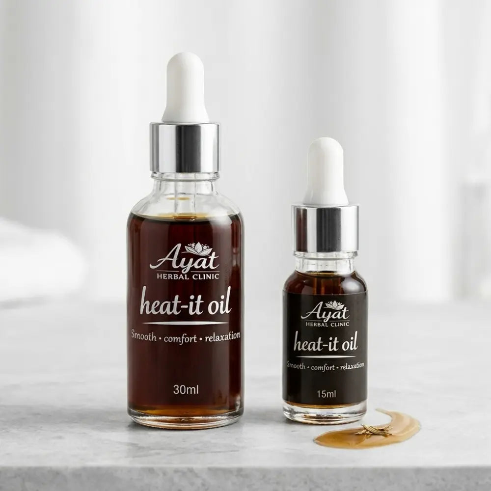 Heat-It Oil by Ayat Herbal Clinic | Comforting Herbal Massage Oil