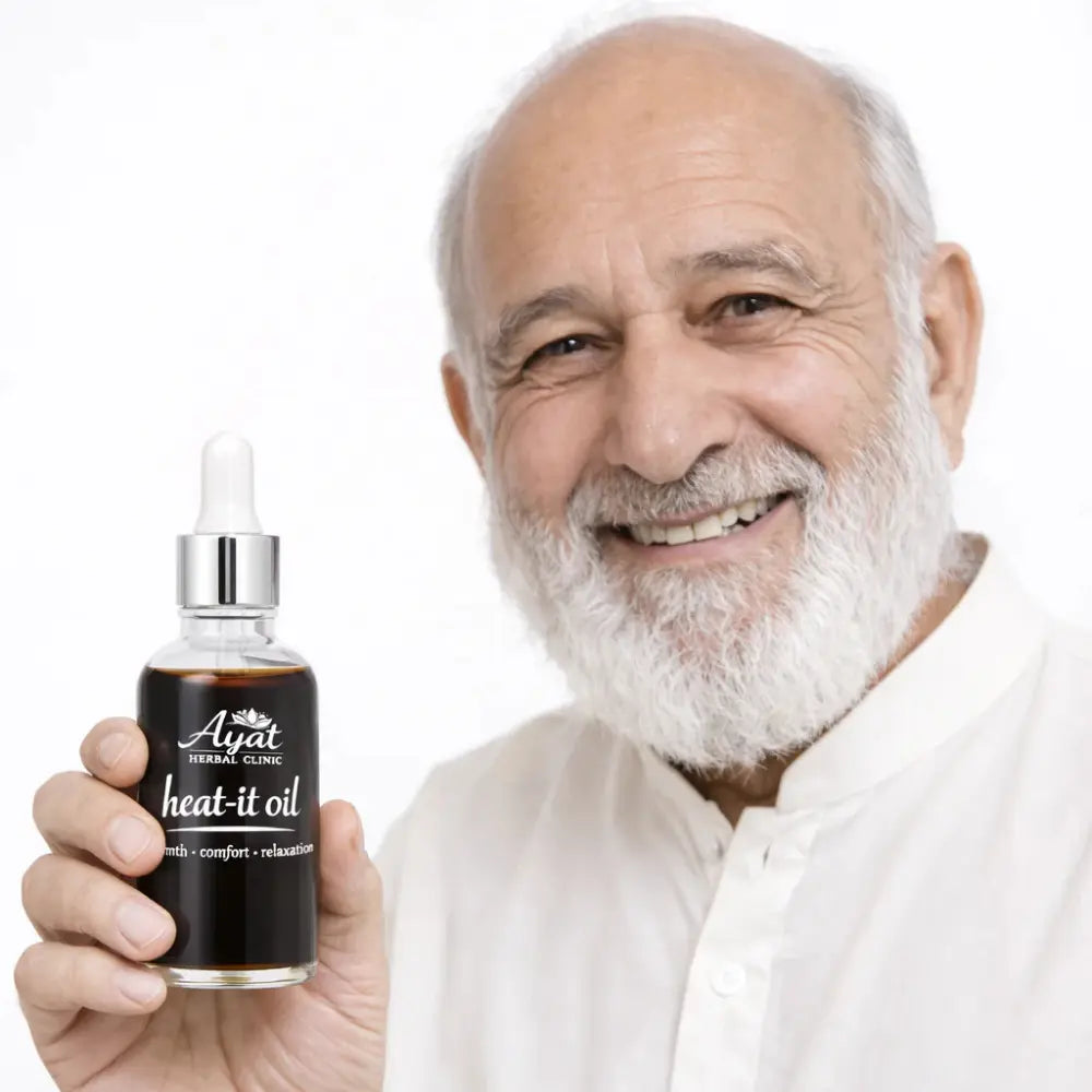 Heat-It Oil by Ayat Herbal Clinic | Comforting Herbal Massage Oil
